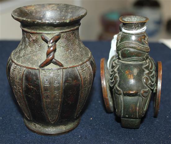 A Chinese small bronze phoenix vase and an archaistic bronze vase, 17th / 18th century, 8.8 and 9.5cm (2)